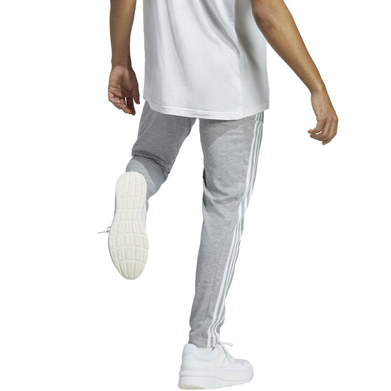 Spodnie męskie adidas Essentials Single Jersey Tapered Open Hem 3-Stripes szare  IC0046